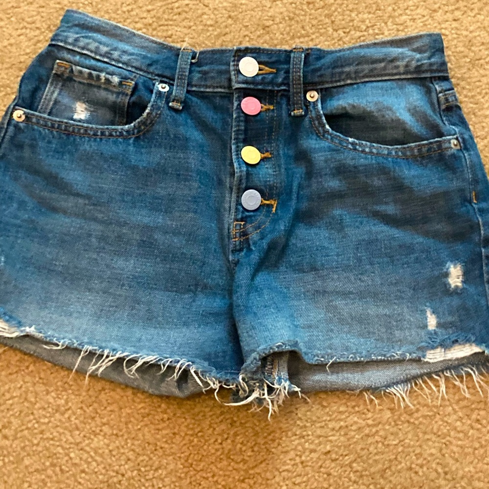 Girls large jean shorts, colored buttons